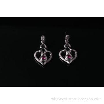Rhodium plated 925 Stering Silver CZ earrings with pink mai